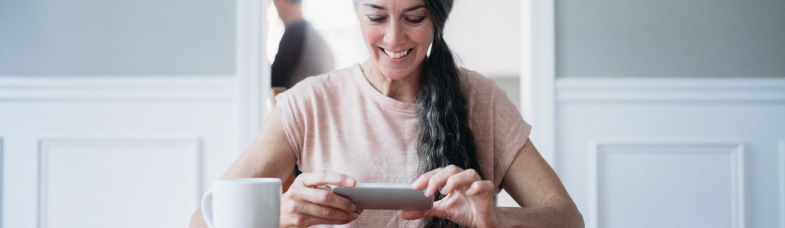 a woman making a mobile check deposit